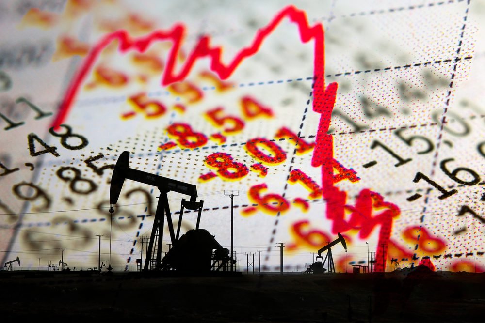 Akciový trh, klesající graf a ropné čerpadlo